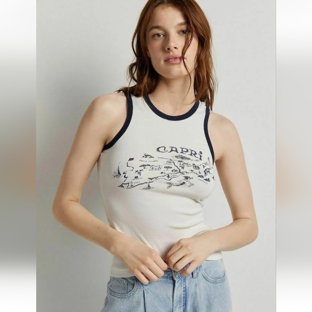 Maeve racerback tank white with blue graphic.